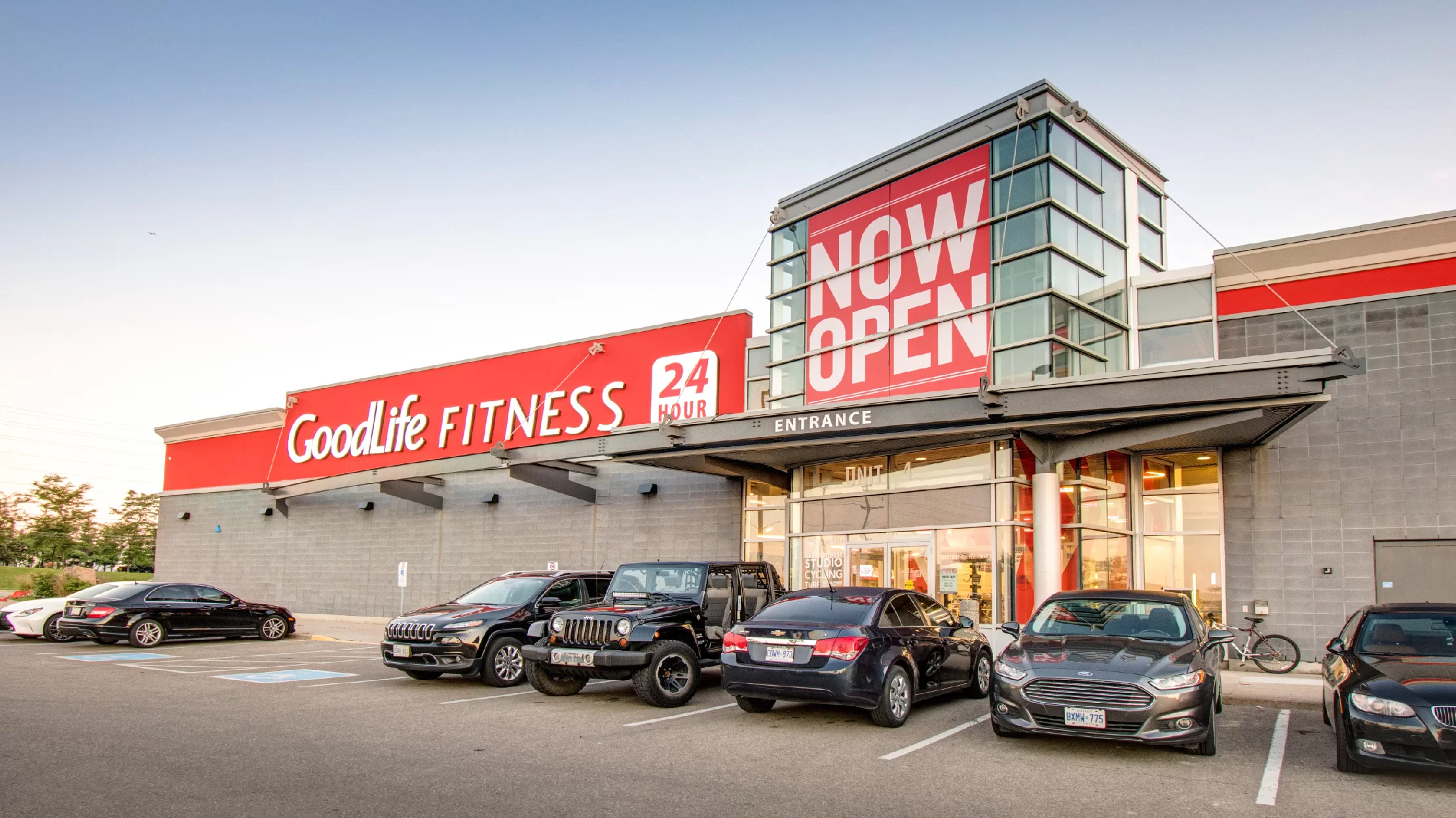 Woodhill Centre, Brampton – GoodLife Fitness 24 Hours storefront with Now Open sign