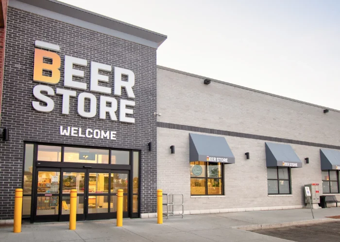 Yonge Green Lane Common, East Gwillimbury – Beer Store entrance with yellow bollards