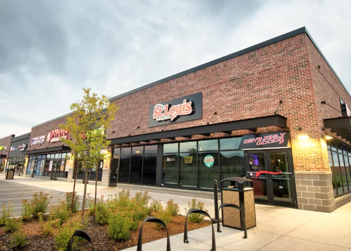 Willmott Marketplace, Milton – St. Louis Bar and Grill storefront at dusk