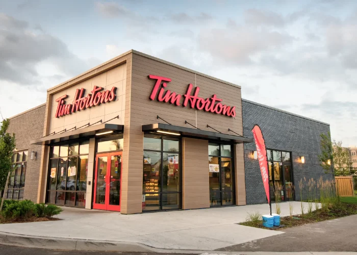 Willmott Marketplace, Milton – Tim Hortons storefront with red flag banner