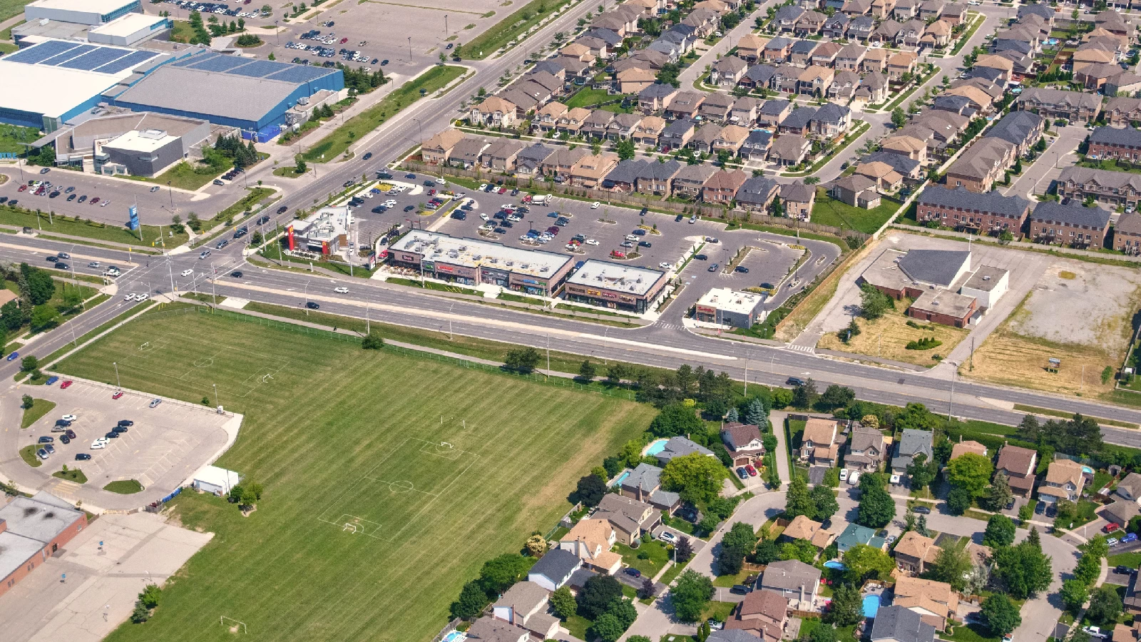 Willmott Marketplace, Milton – aerial view of the plaza, intersection and subdivision
