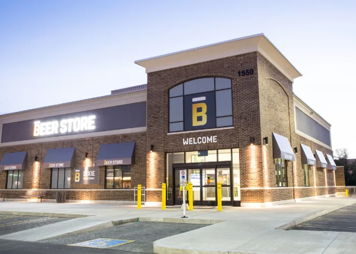 Creekside Crossing, Mississauga – The Beer Store storefront at dusk