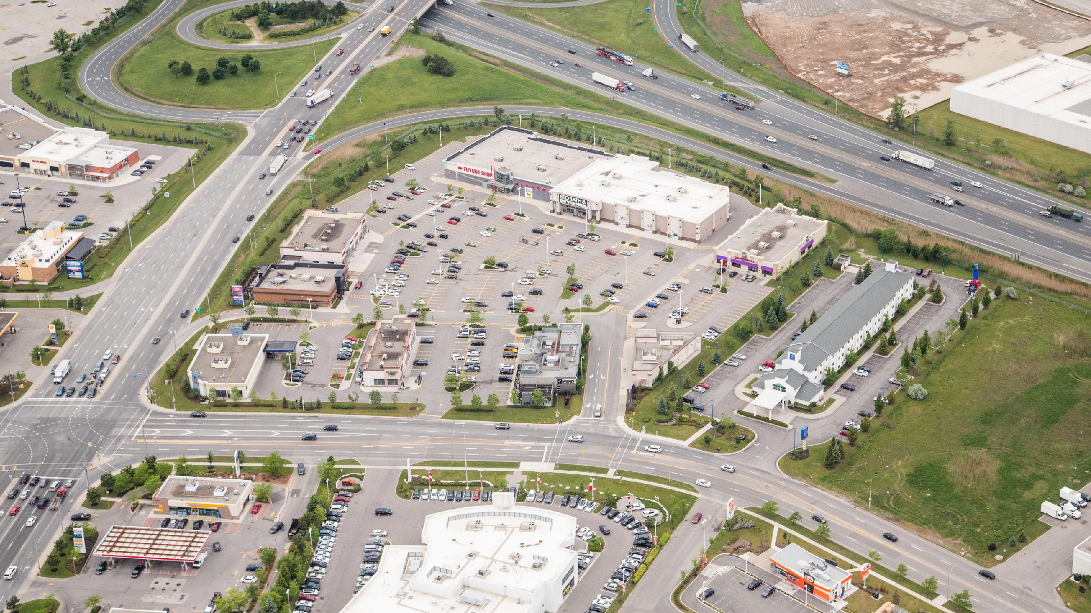 Winston Argentia Centre, Mississauga – aerial view of the plaza beside a highway interchange