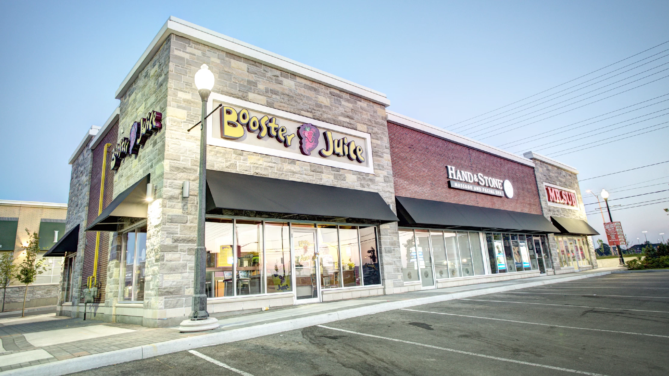 Vellore Village - Phase II, Vaughan – Booster Juice storefront with black awnings