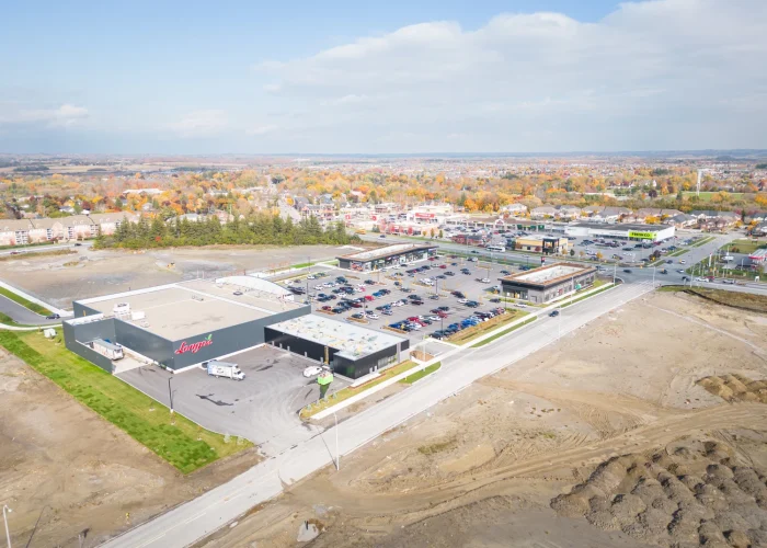 Brooklin Boroughs Phase I, Brooklin – aerial view of the plaza under construction with earth piles
