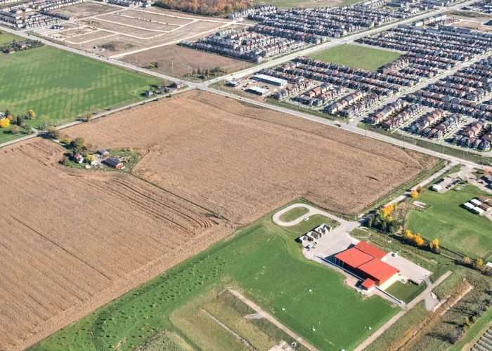 Mayfield Road and Creditview Road, Caledon – aerial view of the undeveloped site with farmland and a subdivision