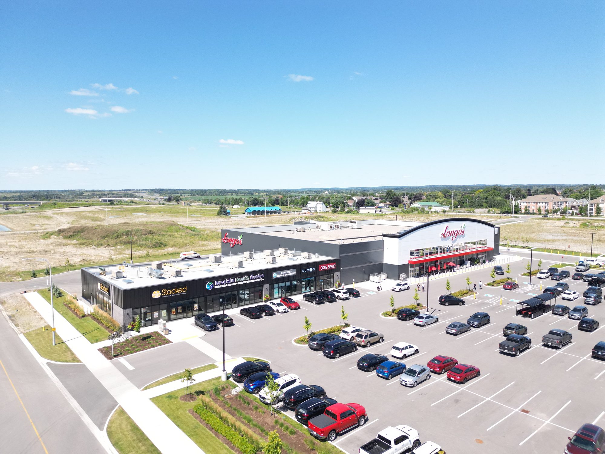 Brooklin Boroughs Phase I, Brooklin – aerial view of the Longo's plaza and retail strip with parking