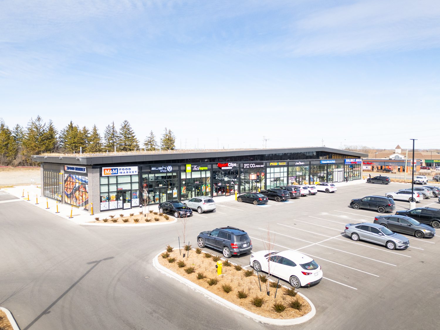 Brooklin Boroughs Phase I, Brooklin – aerial view of a retail strip and parking lot