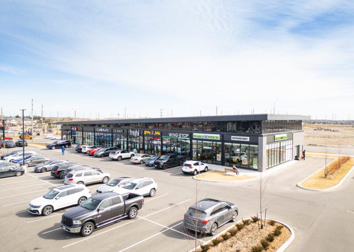 Brooklin Boroughs Phase I, Brooklin – retail strip storefronts with parked cars