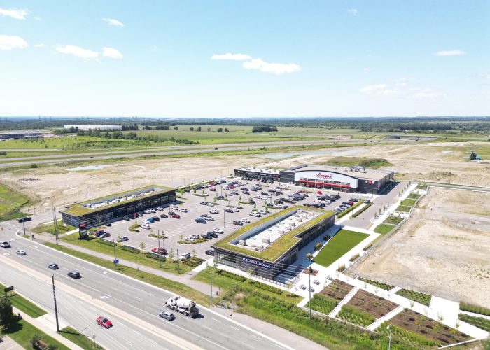 Brooklin Boroughs Phase I, Brooklin – aerial view of the plaza and green-roof retail building by the road