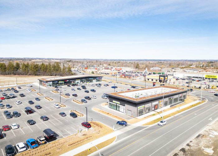 Brooklin Boroughs Phase I, Brooklin – aerial view of a retail strip, parking lot and road