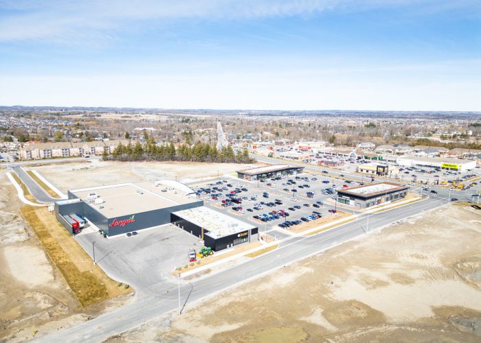Brooklin Boroughs Phase I, Brooklin – aerial view of the Longo's plaza with parking and graded land
