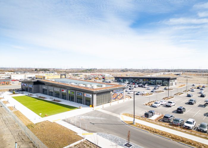 Brooklin Boroughs Phase I, Brooklin – aerial view of a green-roof retail strip and parking lot