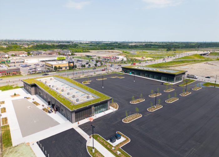 Brooklin Boroughs Phase I, Brooklin – aerial view of two green-roof retail buildings and new parking