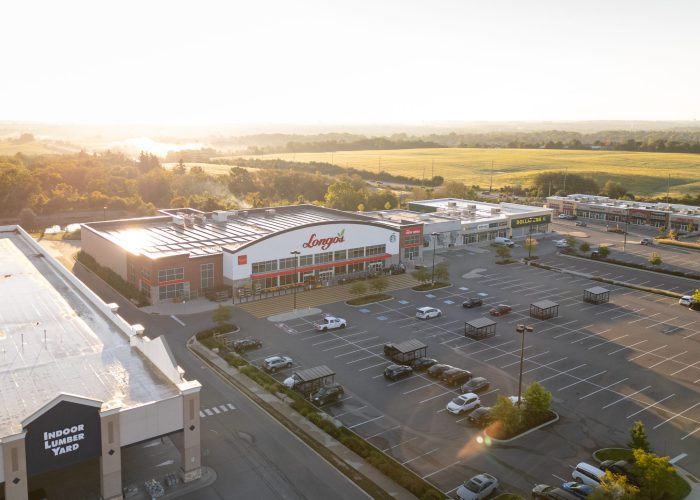 Yonge Green Lane Common, East Gwillimbury – aerial view of the Longo's plaza and parking lot at sunset