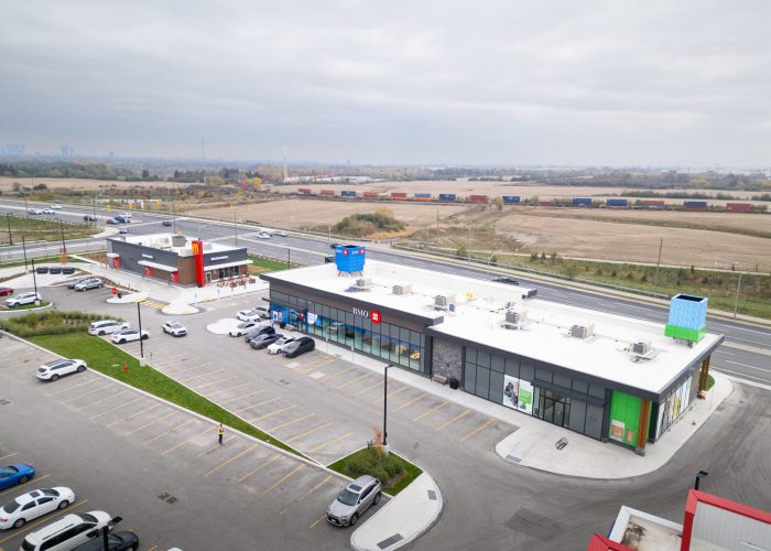 New Kleinburg Marketplace, Kleinburg – elevated view of a retail strip and parking beside a highway