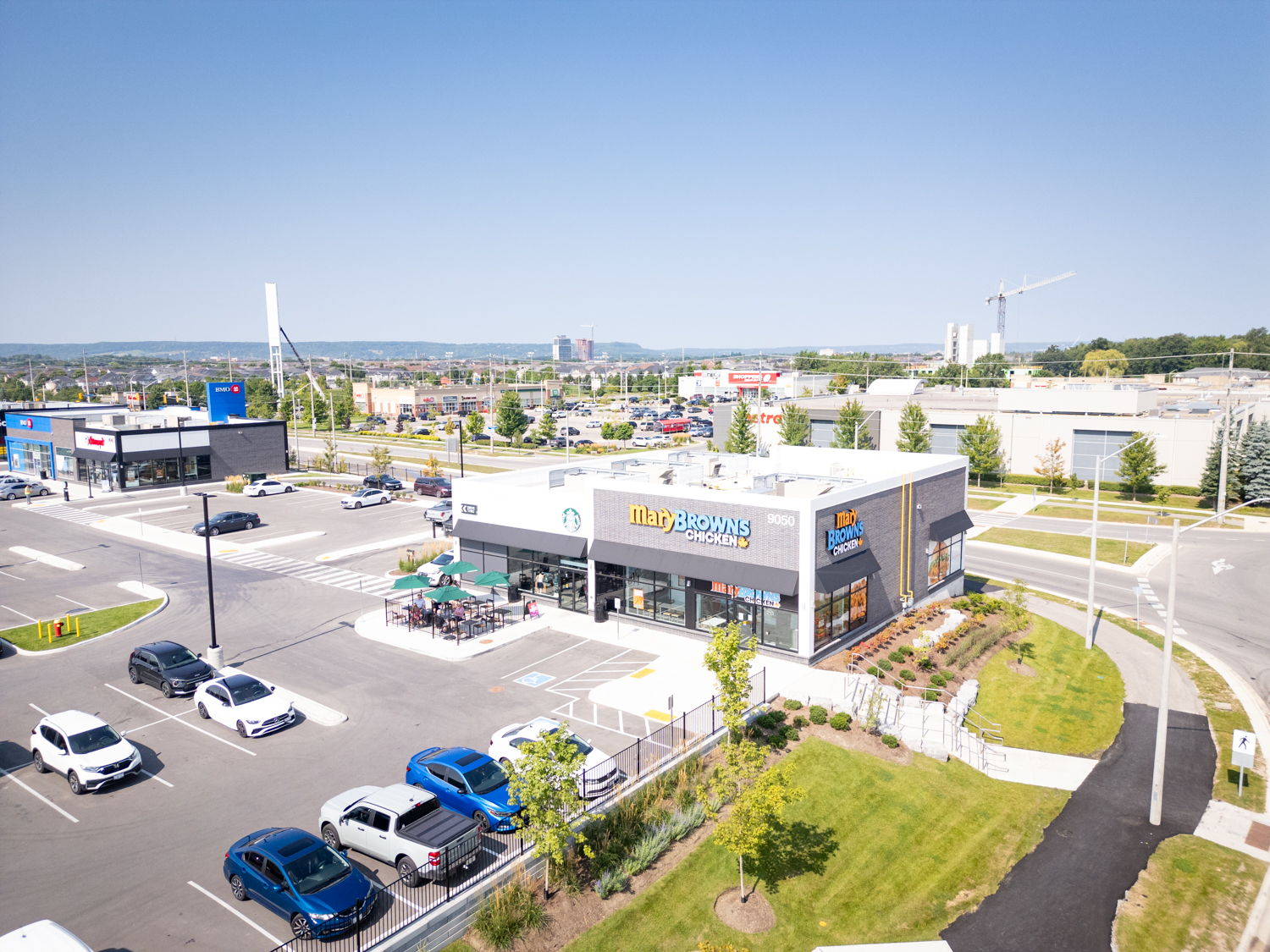Mazmik Marketplace, Milton – aerial view of the Mary Brown's pad building and parking lot