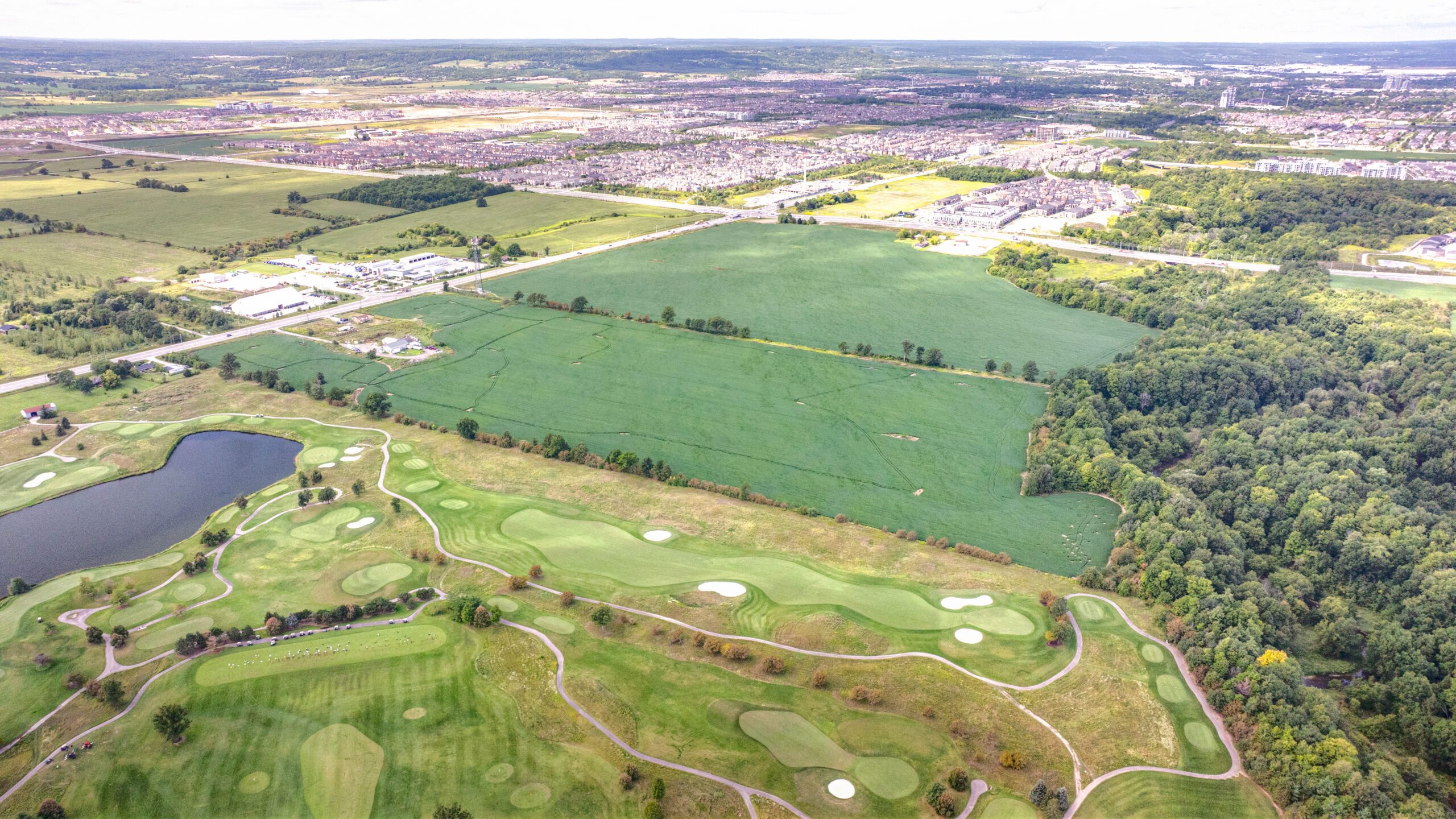Regional Rd 25 & Britannia Rd, Milton – aerial view of the undeveloped site beside a golf course