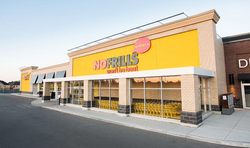 Fieldgate Commercial – No Frills yellow storefront and parking lot